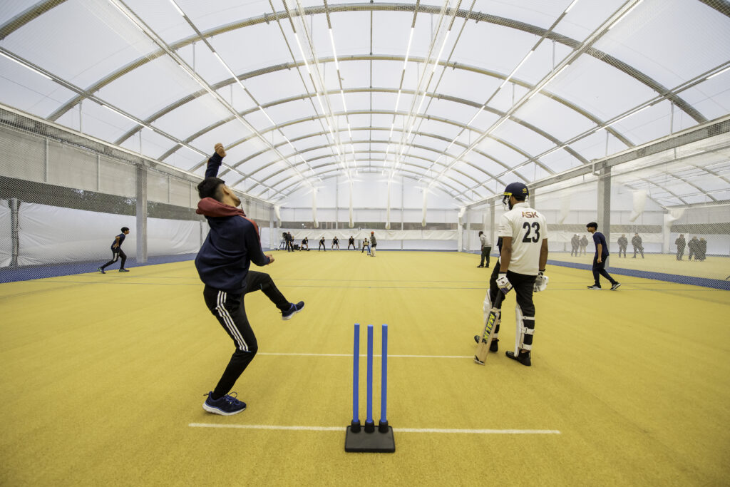Local cricketers using the state-of-the-art outdoor cricket dome facility at Bradford Park Avenue.