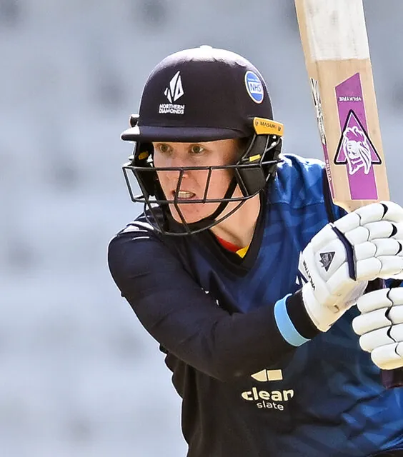 Hollie Armitage plays a shot through the covers in 2022.