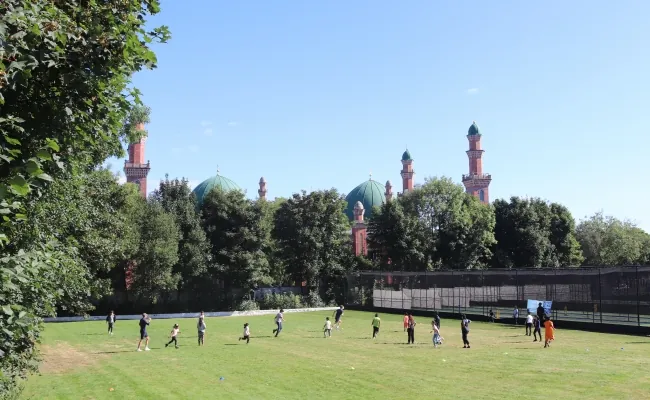 Children playing cricket at bradford park avenue during the summer of 2022