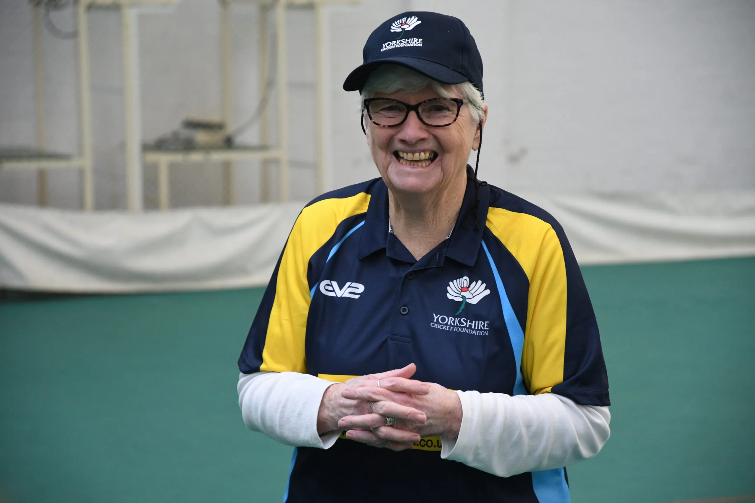 Norah smiling during a walking cricket session in Headingley's cricket center