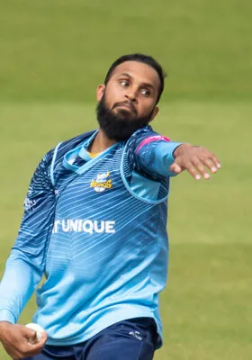 Adil Rashid bowling a ball in a T20 blast fixture from 2022