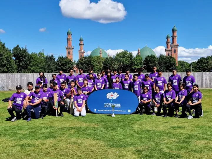 Participants on a Yorkshire Cricket Foundation project gathered around a YCF banner for a picture at Park Avenue Bradford.
