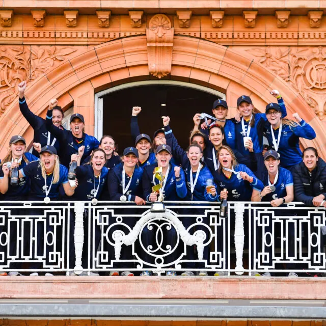 Northern Diamonds celebrating winning the Rachael Heyhoe Flint Trophy on the balcony of their changing room at Lord's in 2022.