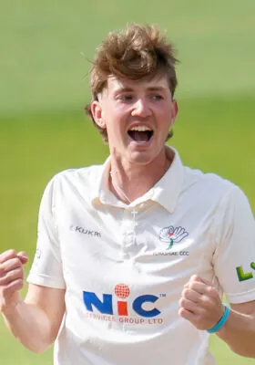 George Hill celebrating having taken a wicket in the County Championship.