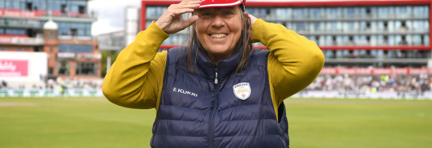 Jane Powell is presented with a cap from her services to coaching by Isa Guha during day four of the 4th Specsavers Ashes Test match between England and Australia at Old Trafford on September 07, 2019 in Manchester