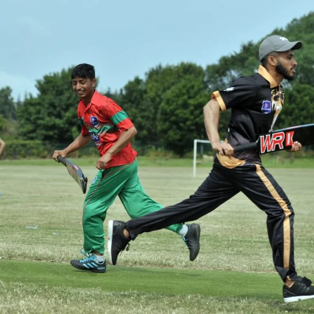 Runners between the wicket during a tapeball cricket match at Myrah Shay.
