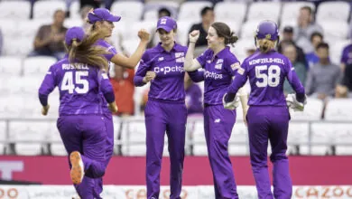 Katie Levick celebrates taking a wicket with her Northern Superchargers' teammates in 2021.