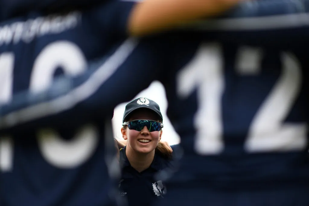 Katherine Fraser of Scotland speaks to their side in the huddle during the ICC Women's U19 T20 World Cup 2023 4th place playoff match between USA and Scotland at Willowmoore Park on January 20, 2023 in Benoni, South Africa. 