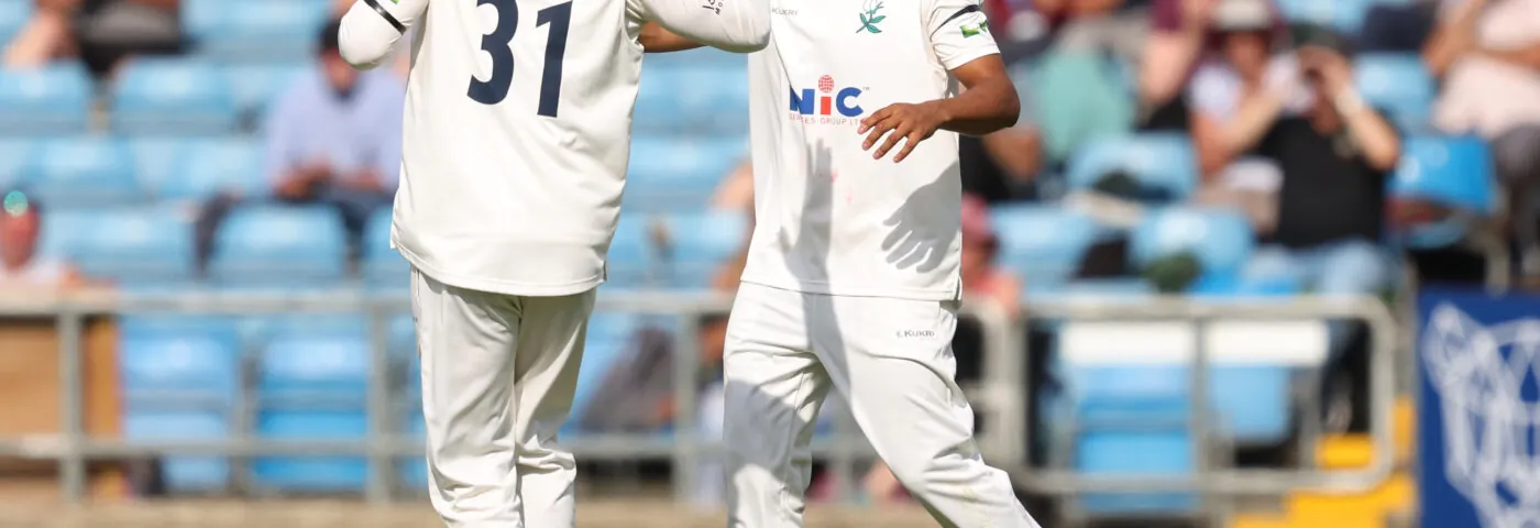 Will Fraine and Ben Mike celebrating a wicket at Headingley.
