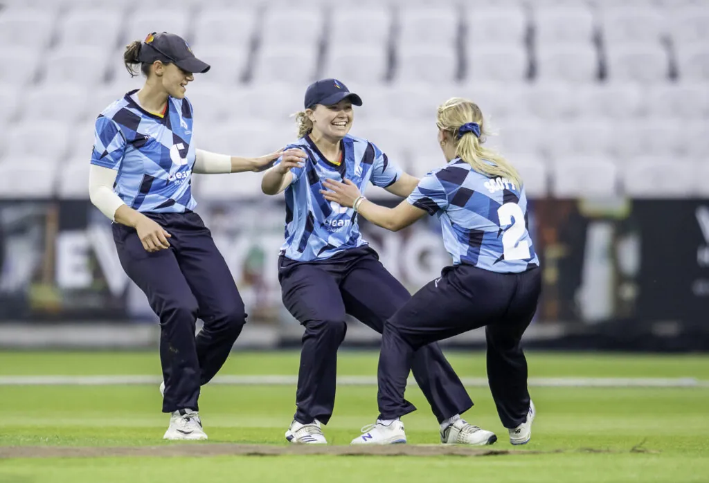 Northern Diamonds' Grace Hall celebrates her catch from the bowling of Lizzie Scott to dismiss Western Storm's Natasha Wraith at Headingley. 
