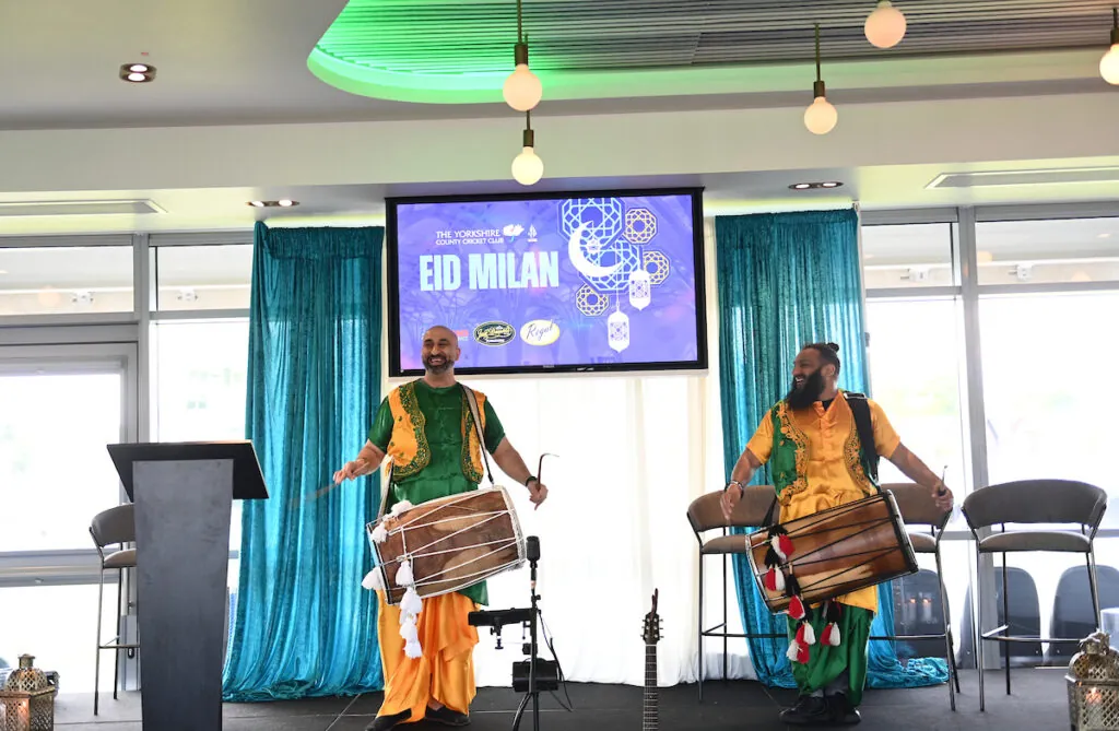 Pictured, drummers take part in a bright and colourful, evening at Headingley for the Eid Milan event. 