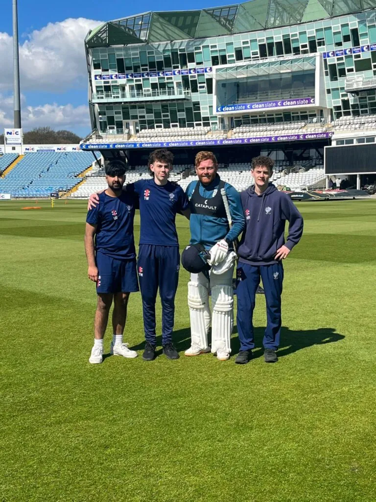 Yorkshire and England batter, Jonny Bairstow, is pictured alongside students from the Yorkshire Cricket College. 