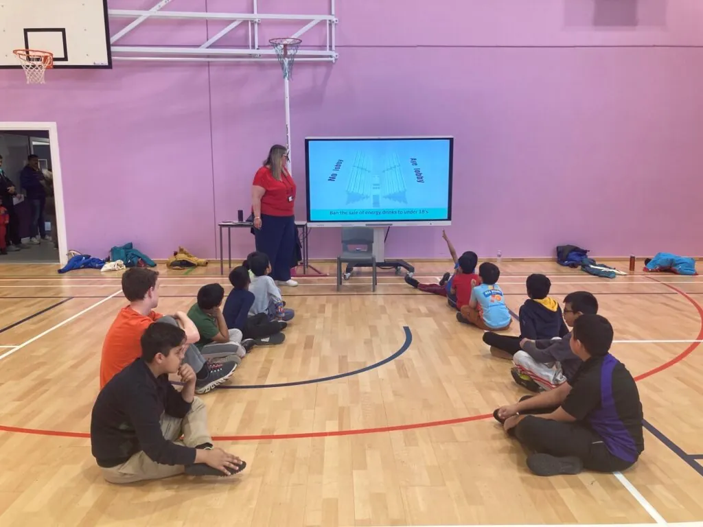 Rachael Dodgson is pictured from the UK Parliament Education team delivering a session to the kids. 