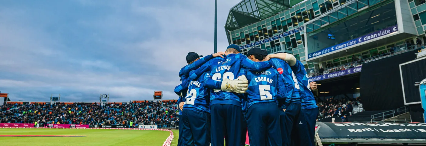 The Yorkshire Vikings in a huddle ahead of fielding in the 2023 Roses T20 game