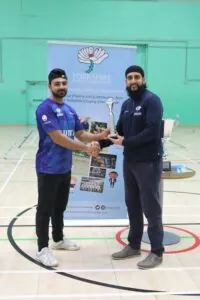 Luqman Ali receives his Player of the final award.