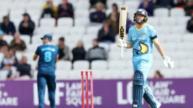Adam Lyth raises his bat having made a half-century against Derbyshire Falcons at Headingley